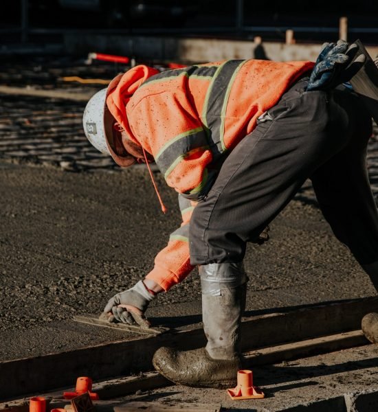 The workers in the construction site